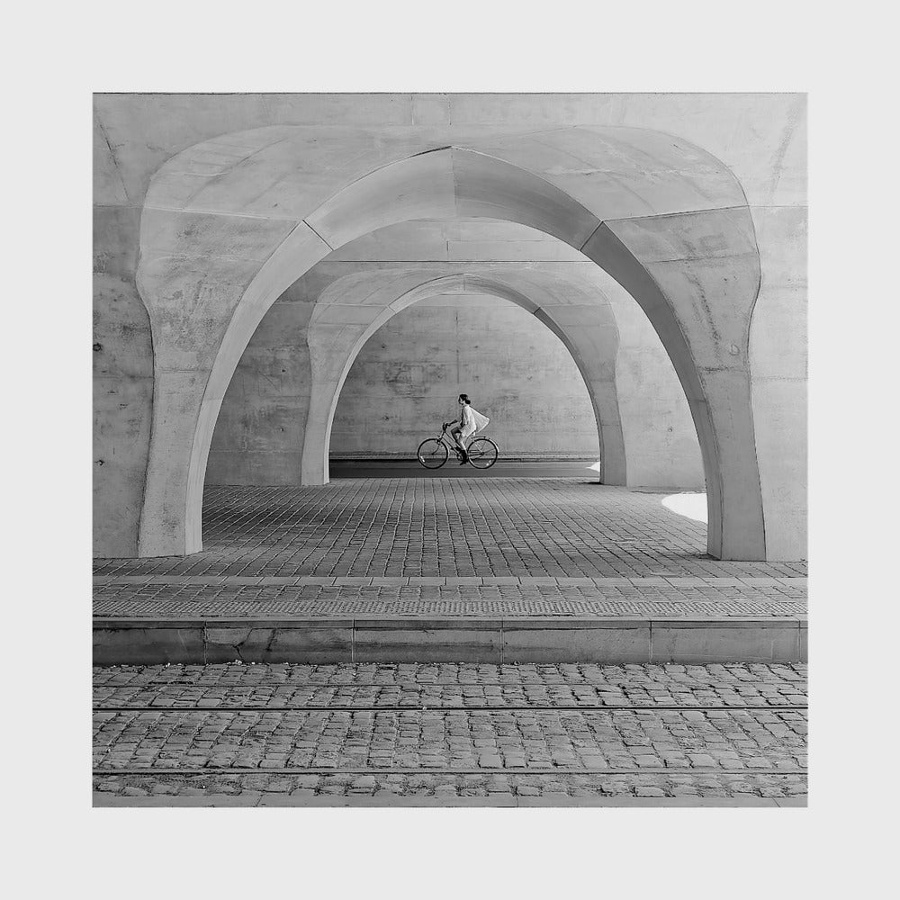 Cyclists under the arches