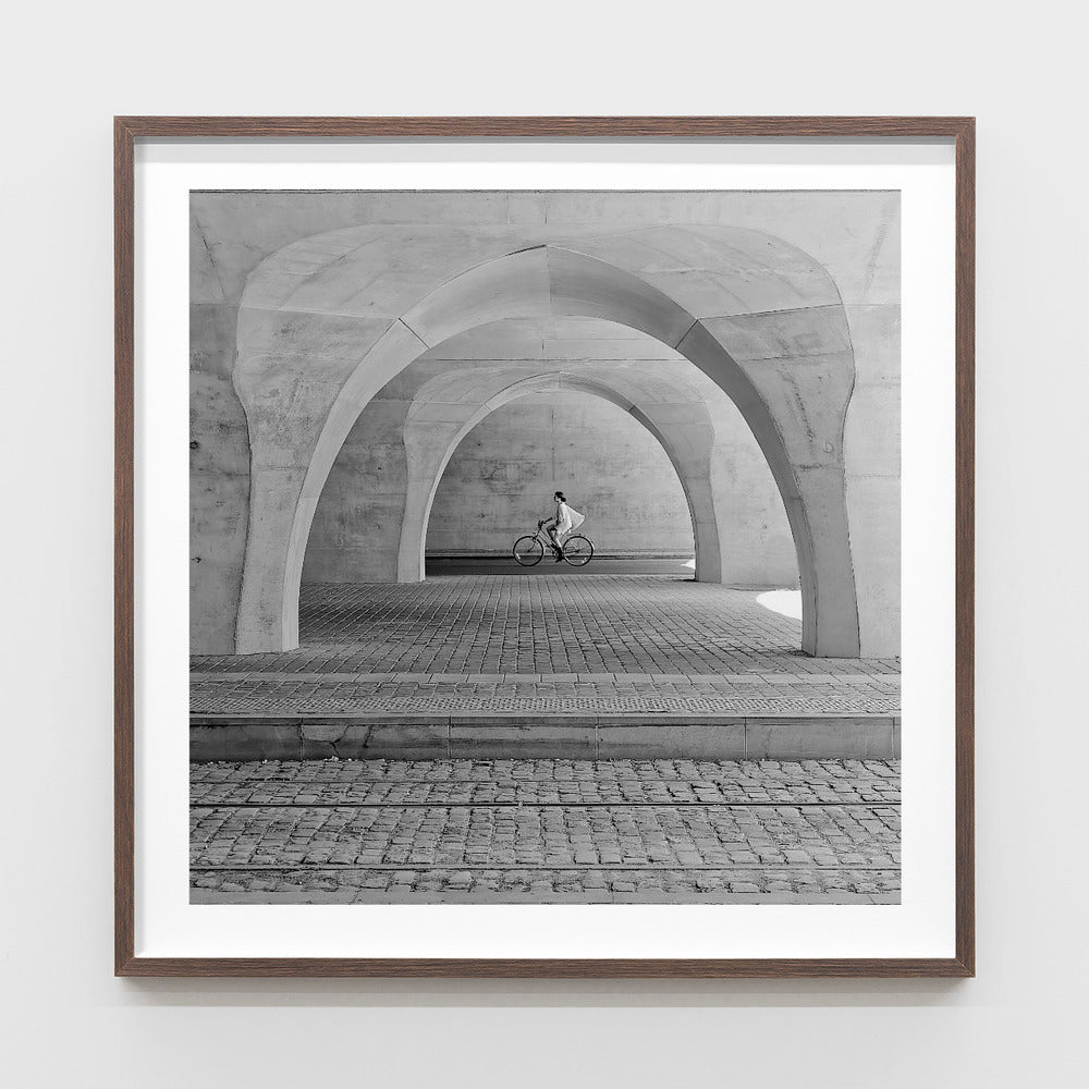 Cyclists under the arches